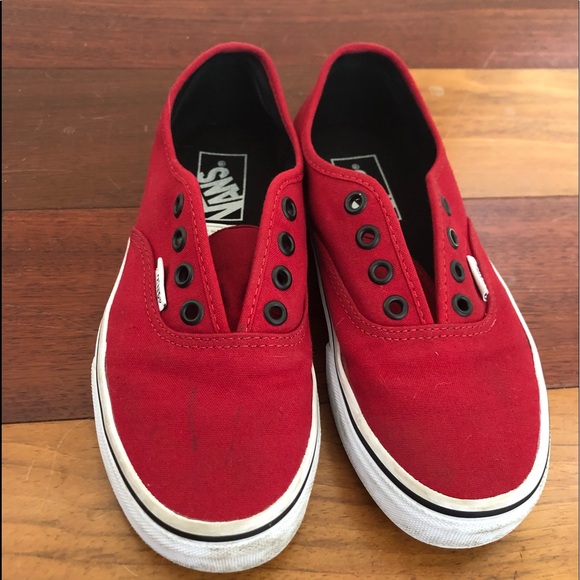 black vans with red laces